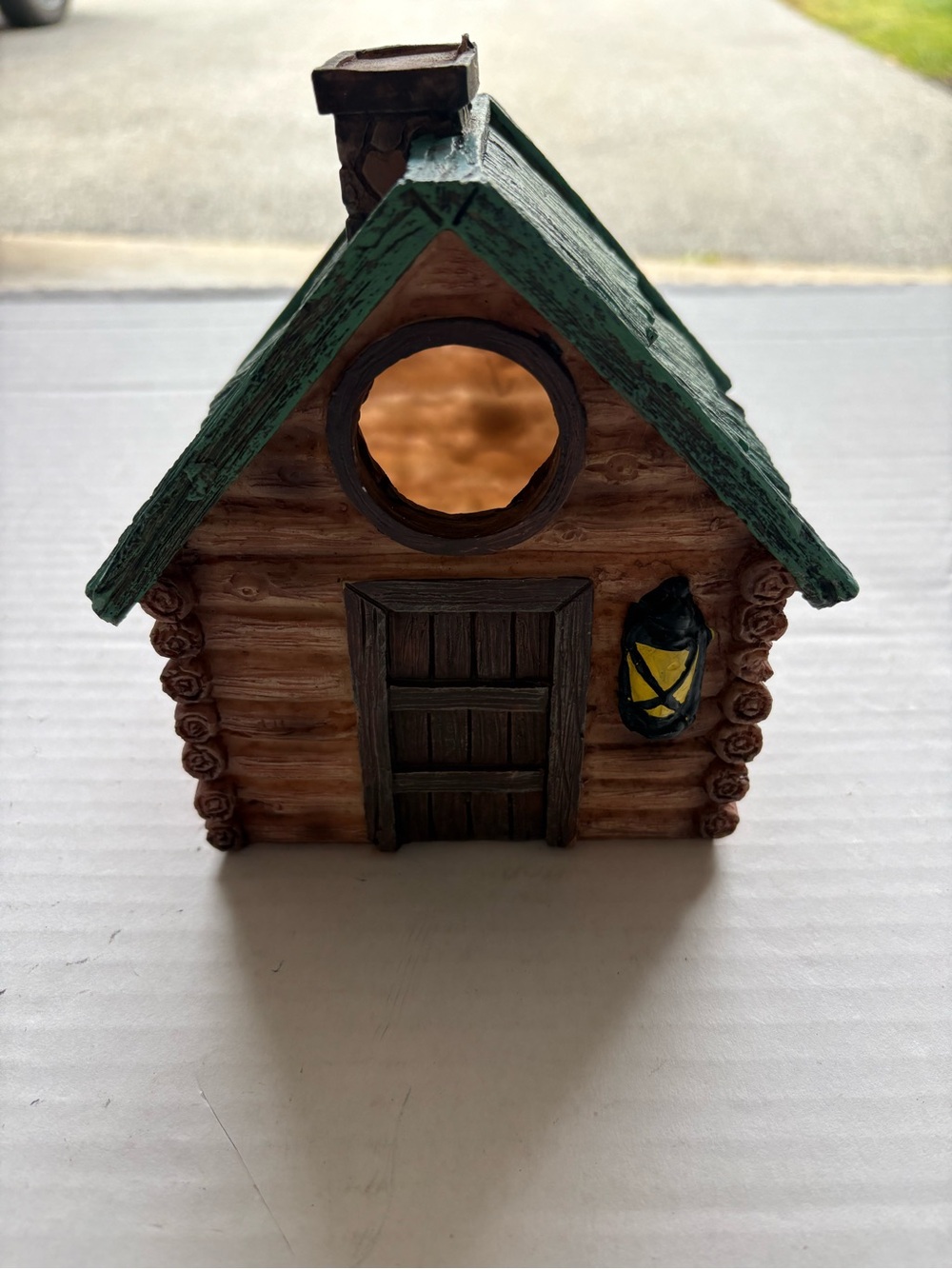 Source Unknown Brown Log Cabin Birdhouse with Green Roof and Yellow Lantern